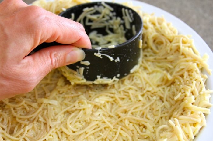 Jarlsberg Pasta Pie7 - 6 Press into pie plate with measuring cup