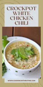 Set it and forget it! This Magic White Chicken Chili made in the crock pot delivers creamy beans, tender chicken and bold flavor with minimal effort&mdash;perfect for busy nights. | cookingwithruthie.com #WhiteChickenChili #SlowCookerDinner #ComfortFood #BeanSoup #CookingWithRuthie #EasyWeeknightMeal #CrowdPleaser