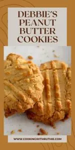 Golden-baked peanut butter cookies with a tender, buttery texture &mdash; these classic treats are perfect for cozy December afternoons, holiday cookie trays, or warm winter snacks with a mug of cocoa. 🍪 | cookingwithruthie.com #peanutbuttercookies #classiccookies #winterbaking #holidaycookies #cozycookies #christmasdesserts #pinterestfood #cookingwithruthie