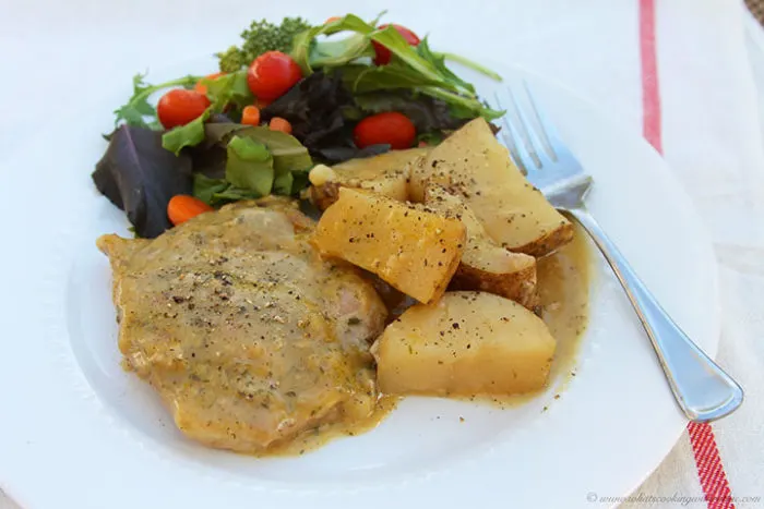 Slow Cooker Ranch Por Chops with Potatoes by www.whatscookingwithruthie.com