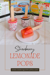 Beat the summer heat with these Strawberry Lemonade Pops. Refreshing and perfect for all ages! 🍓🍋🍭 #PopsicleRecipe #SummerTreats #StrawberryLemonade || cookingwithruthie.com