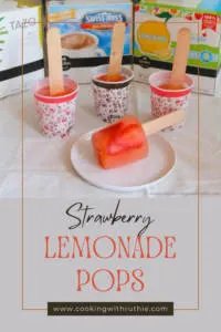 Beat the summer heat with these Strawberry Lemonade Pops. Refreshing and perfect for all ages! 🍓🍋🍭 #PopsicleRecipe #SummerTreats #StrawberryLemonade || cookingwithruthie.com