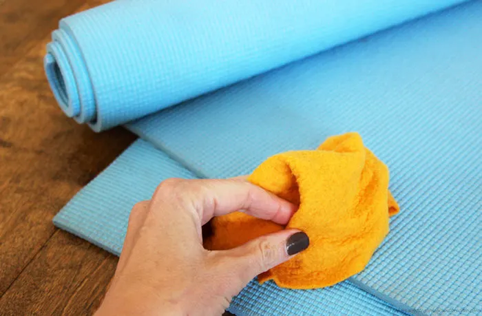 How to Clean your Yoga Mat is a quick and easy tip for a fresh smelling mat! by www.cookingwithruthie.com #yoga #cleaning #tip