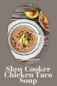 This Slow Cooker Chicken Taco Soup is loaded with tender chicken, beans, corn, and taco spices&mdash;set it in the morning and come home to dinner that&rsquo;s ready to eat. | cookingwithruthie.com #TacoSoup #SlowCookerMeals #ChickenSoup #ComfortFood #CookingWithRuthie #OnePotMeal #EasyDinners #MexicanInspired