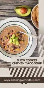 This slow cooker chicken taco soup combines the bold flavors of taco seasoning with tender chicken and creamy cream cheese. It's a satisfying and easy-to-make meal that the whole family will love. Serve with avocado slices and crunchy tortilla chips for the ultimate comfort food experience. #ChickenSoup #SlowCookerMeals #TacoSoup #FamilyDinner #CookingWithRuthie
