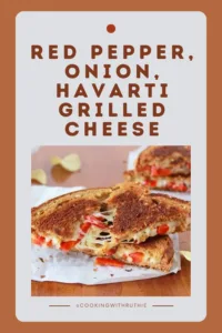 Enjoy a gourmet twist with Red Pepper and Onion Havarti Grilled Cheese! Melted Havarti cheese, sautéed red peppers, and onions, grilled to perfection. Perfect for lunch or dinner. #GrilledCheese #HavartiSandwich #GourmetLunch #QuickMeals #DeliciousSandwiches #ComfortFood || cookingwithruthie.com