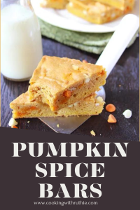 Indulge in the flavors of fall with these soft and chewy pumpkin spice bars, packed with pumpkin puree and a blend of warm spices. Topped with white chocolate chips and pumpkin spice chips, they're a delightful treat for autumn gatherings. Perfect for sharing with friends and family! #PumpkinSpiceBars #FallBaking #AutumnTreats #ComfortFood #CookingWithRuthie