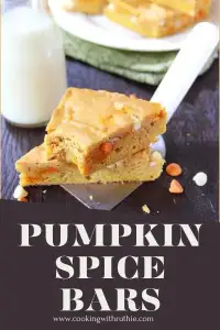 Indulge in the flavors of fall with these soft and chewy pumpkin spice bars, packed with pumpkin puree and a blend of warm spices. Topped with white chocolate chips and pumpkin spice chips, they're a delightful treat for autumn gatherings. Perfect for sharing with friends and family! #PumpkinSpiceBars #FallBaking #AutumnTreats #ComfortFood #CookingWithRuthie