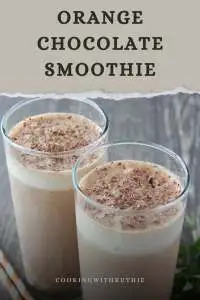 Creamy chocolate milk, Greek yogurt and fresh clementines blended into a rich chocolate-orange smoothie &mdash; the perfect festive and energizing drink to warm up cold days or kick off a chilly December morning. 🍊🍫 | cookingwithruthie.com #orangechocolatesmoothie #holidaydrinks #winterrecipes #cozybeverages #smoothielover #chocolatelove #pinterestfood #cookingwithruthie
