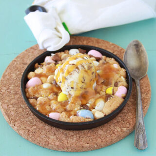 Cadbury Egg Cookie Pizzooki is a warm cookie made with lots of chocolate and topped with ice cream! www.cookingwithruthie.com