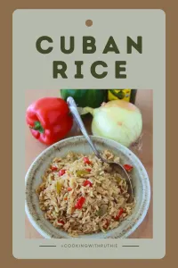 Bring the taste of Cuba to your kitchen! This flavorful Cuban Rice recipe is packed with savory spices and perfect as a side or main dish. Easy to make and irresistibly aromatic! || cookingwithruthie.com #CubanRice #LatinCuisine #EasyRecipes #RiceLovers #WeeknightMeals #HomeCooking #FlavorfulEats #CookingWithRuthie