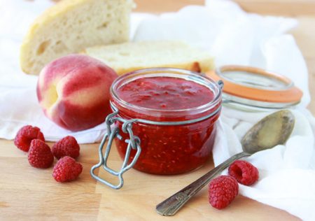 Peach Raspberry Freezer Jam is going to be your new family favorite! www.cookingwithruthie.com