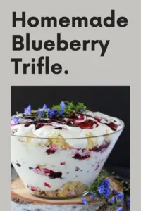 Layers of cream, cake, and fresh berries—this blueberry trifle is summertime in a glass! 🫐🍰 #blueberrydessert #triflerecipe #layereddesserts #easybakes #summerberries #sweetlayers #homemadetreats #dessertvibes || cookingwithruthie.com