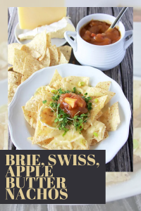 Elevate your snack game with this decadent autumn appetizer! Crisp tortilla chips topped with melted Swiss and Brie cheeses, drizzled with homemade cinnamon apple butter, and garnished with microgreens and chives. A delightful blend of savory and sweet in every bite. Perfect for cozy gatherings or a special treat. #FallFlavors #GourmetNachos #AutumnAppetizers #CookingWithRuthie