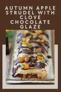 Flaky strudel pastry filled with spiced apples and drizzled with rich clove-infused chocolate glaze. The perfect fall dessert! || cookingwithruthie.com #AppleStrudel #FallDesserts #ChocolateGlaze #AutumnBaking #CookingWithRuthie