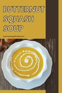 Comforting, velvety, and full of fall flavor—this soup blends roasted squash with warm spices and finishes with a cinnamon-spiced crema swirl. || cookingwithruthie.com #ButternutSquashSoup #FallRecipes #SoupSeason #CookingWithRuthie #CozyMeals