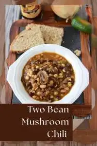 This Two‑Bean Mushroom Chili is rich, smoky, and plant‑based &mdash; a nutritious bowl loaded with beans, mushrooms, tomatoes, and warming spices. | cookingwithruthie.com #VeganChili #MushroomChili #BeanRecipes #ComfortFood #CookingWithRuthie #PlantBasedMeals #HealthyDinner #ChiliSeason