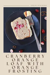 Zesty orange meets tart cranberries in this soft, slightly sweet sourdough loaf topped with orange frosting — a perfect cozy bake for December breakfasts, holiday brunches or festive dinners. 🍞🍊 | cookingwithruthie.com #cranberrybread #orangeloaf #holidaybaking #winterbrunch #festivefood #christmasrecipes #pinterestfood #cookingwithruthie