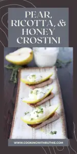 Crispy crostini topped with creamy ricotta, juicy pear slices and a drizzle of honey — this Pear‑Ricotta & Honey Crostini is a simple yet elegant appetizer that’s perfect for holiday gatherings, cozy December dinners or festive brunches. 🍐🥖 | cookingwithruthie.com #holidayappetizers #crostini #winterbrunch #festivefood #ricottarecipes #holidayentertaining #pinterestfood #cookingwithruthie